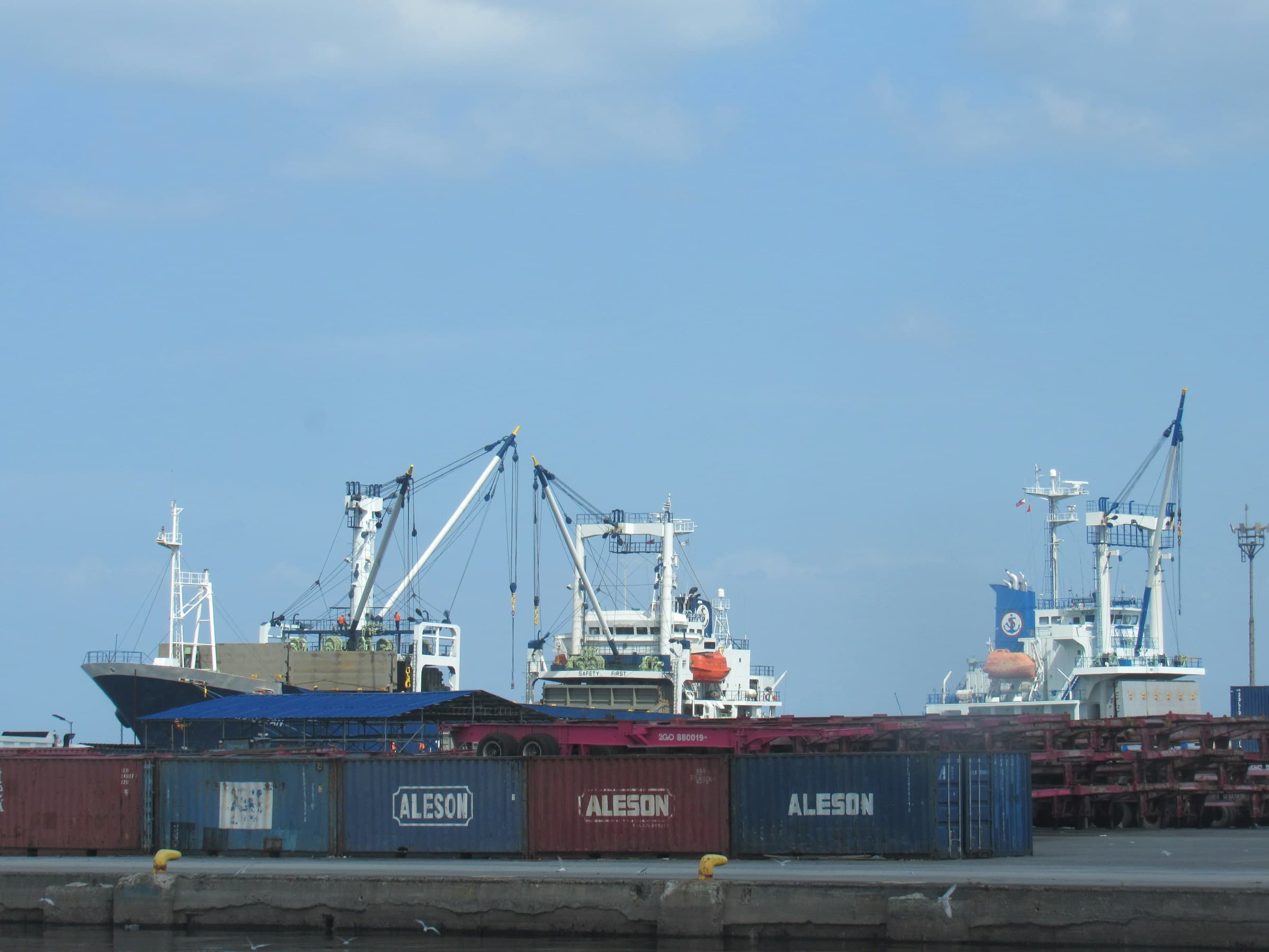 Cargo vessels and containers at a port